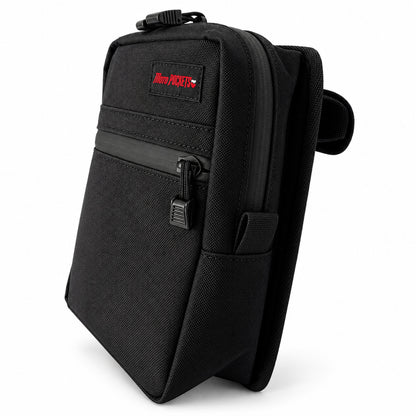 Angled side view of black Moto Pockets Drifter motorcycle handlebar bag showing durable Cordura fabric, front zippered pocket, main compartment, and compact profile.