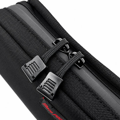 Close-up of Moto Pockets Mini T-Bar motorcycle handlebar bag showing YKK water-resistant zipper, dual easy-grip zipper pulls, and durable black Cordura fabric.